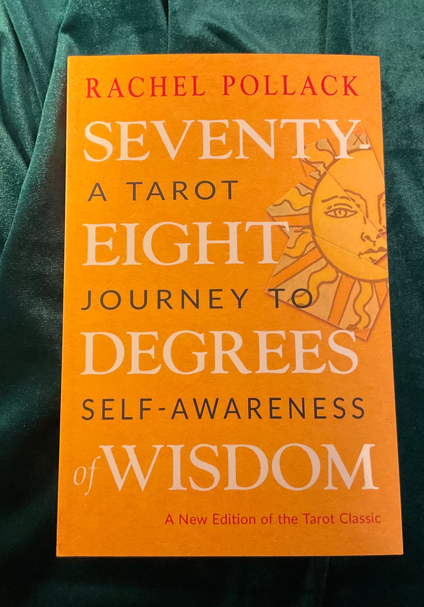 Book cover of 'Seventy-Eight Degrees of Wisdom' by Rachel Pollack on an orange background.